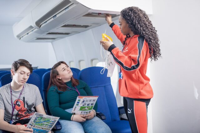 Students in mock aircraft cabin