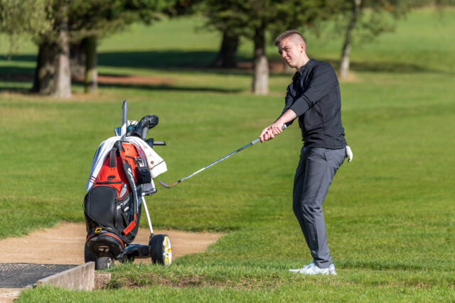 Student golfer on the course