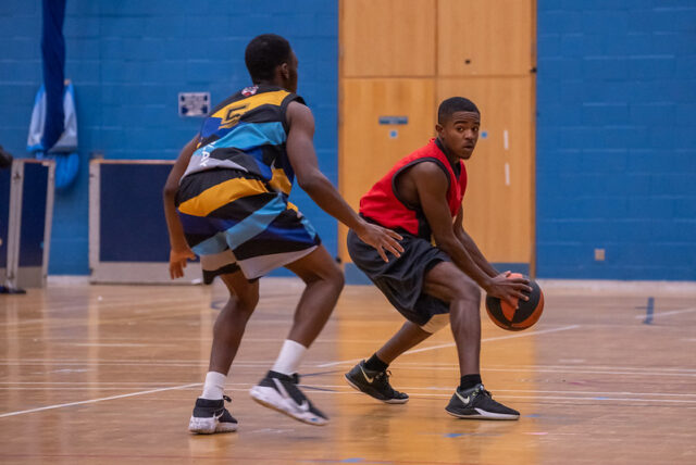 Basketball team playing in match