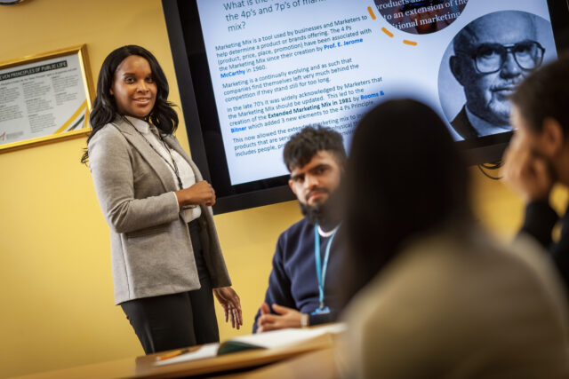 Business students giving a presentation