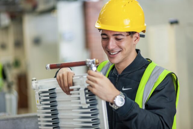 Student plumbing radiator