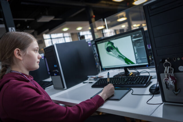 Student designing on computer