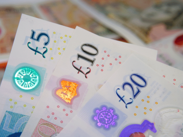 Close up of corners of UK £5, £10, £20 banknotes