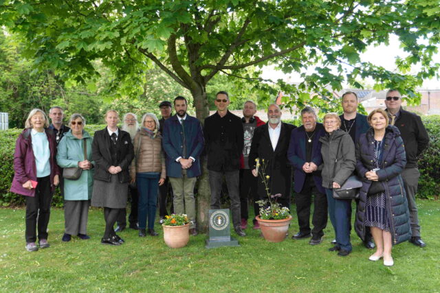 New stone plaque celebrating human rights at Sutton Coldfield College.