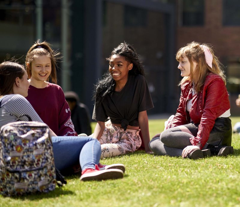 Students_sitting_on_grass