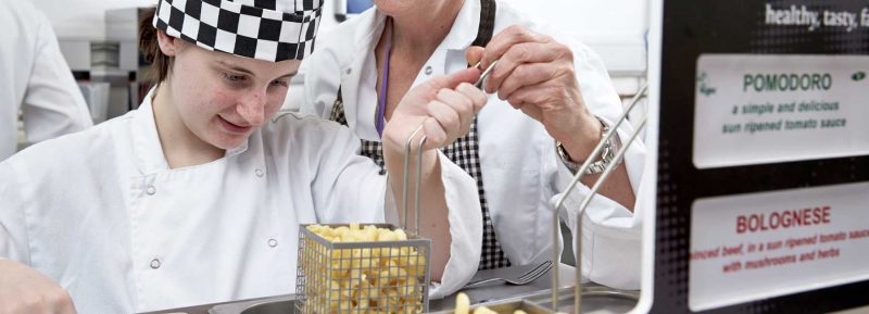 student with disability cooking