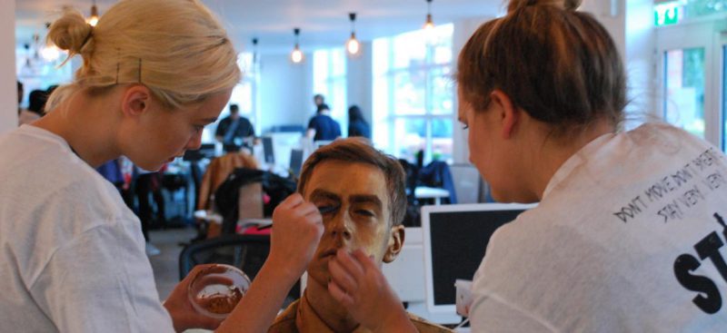 students applying film make up