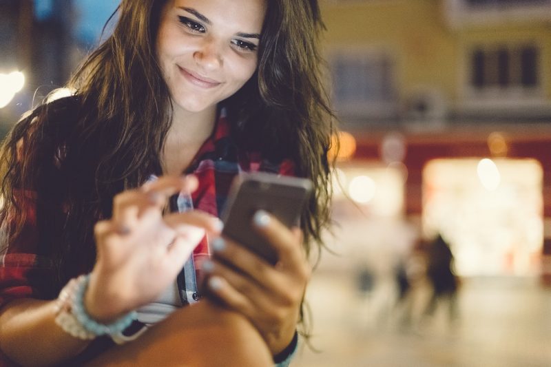 teenage girl on phone apps