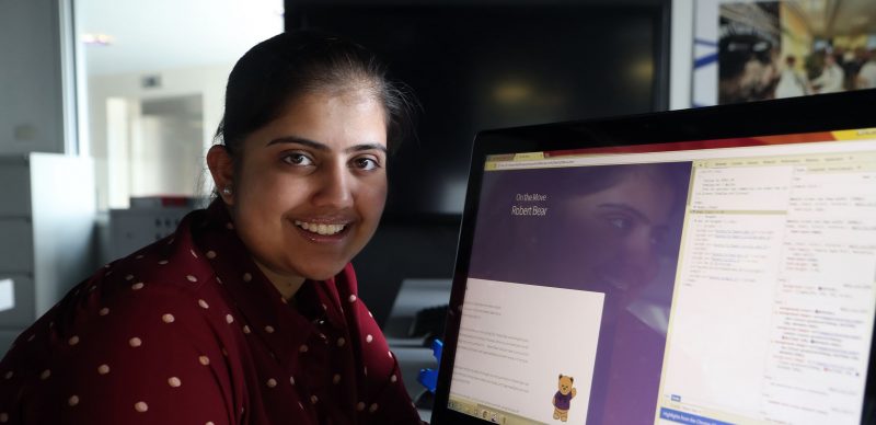 student at her computer