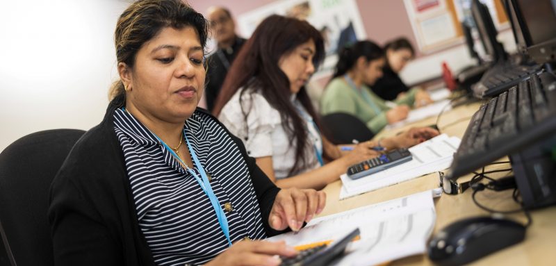 Adult learners in maths class