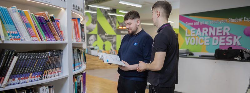 Two students in the library
