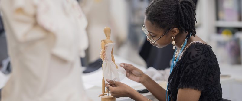 Fashion student with mannequin